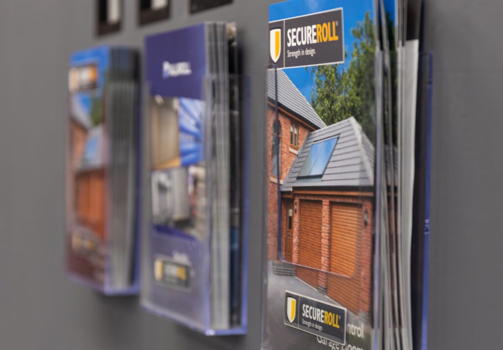 brochures on wall for Secureroll