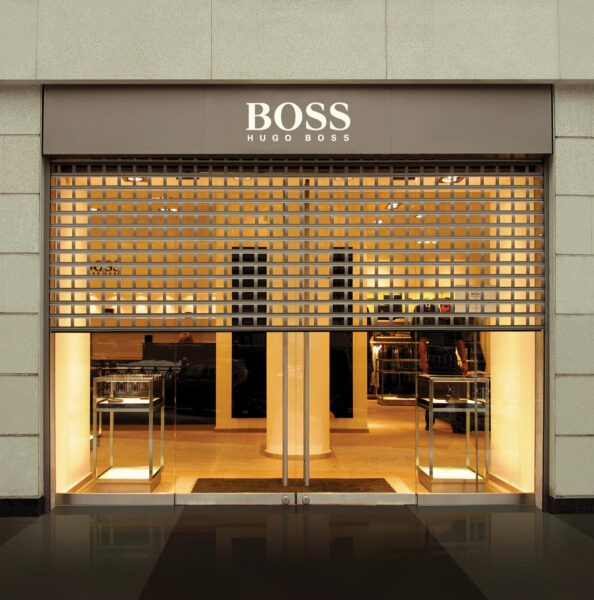 Retail security shutters being used at a Hugo Boss storefront
